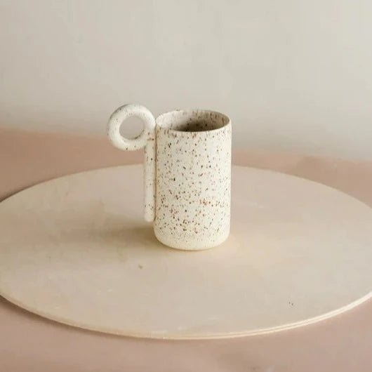 http://giftandgather.com/cdn/shop/products/loop-mug-speckled-cream-tall-386407_600x.webp?v=1678831802