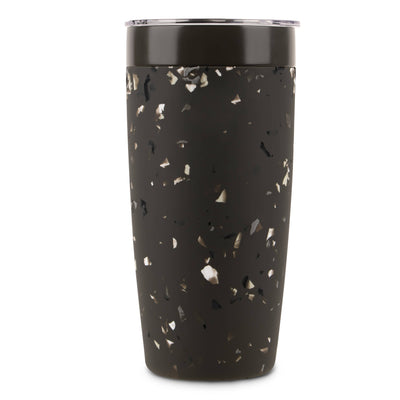 Black tumbler with speckled pattern on a white background