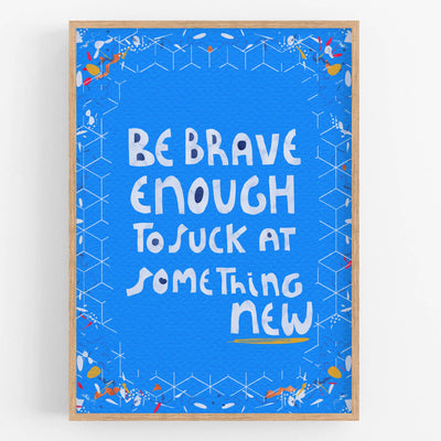 Motivational card with text 'Be brave enough to suck at something new' on a blue background