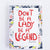 Card with 'Don't be a lady, be a legend' text and colorful border on a white background