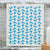 White dishcloth with blue floral pattern on a kitchen counter