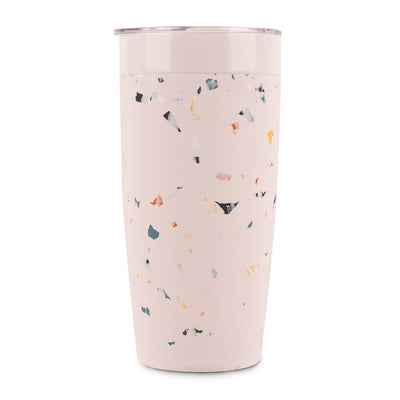 Pink tumbler with multicolor speckled pattern on a white background
