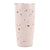 Pink tumbler with multicolor speckled pattern on a white background
