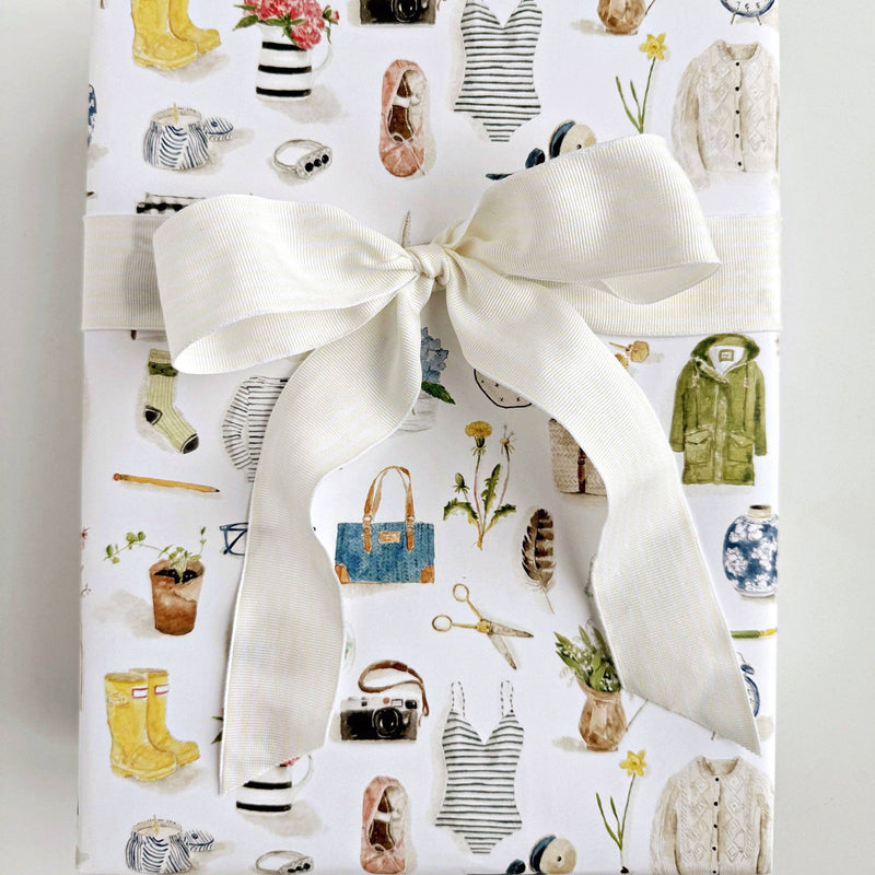 Gift wrap sheets with illustrations on a white background