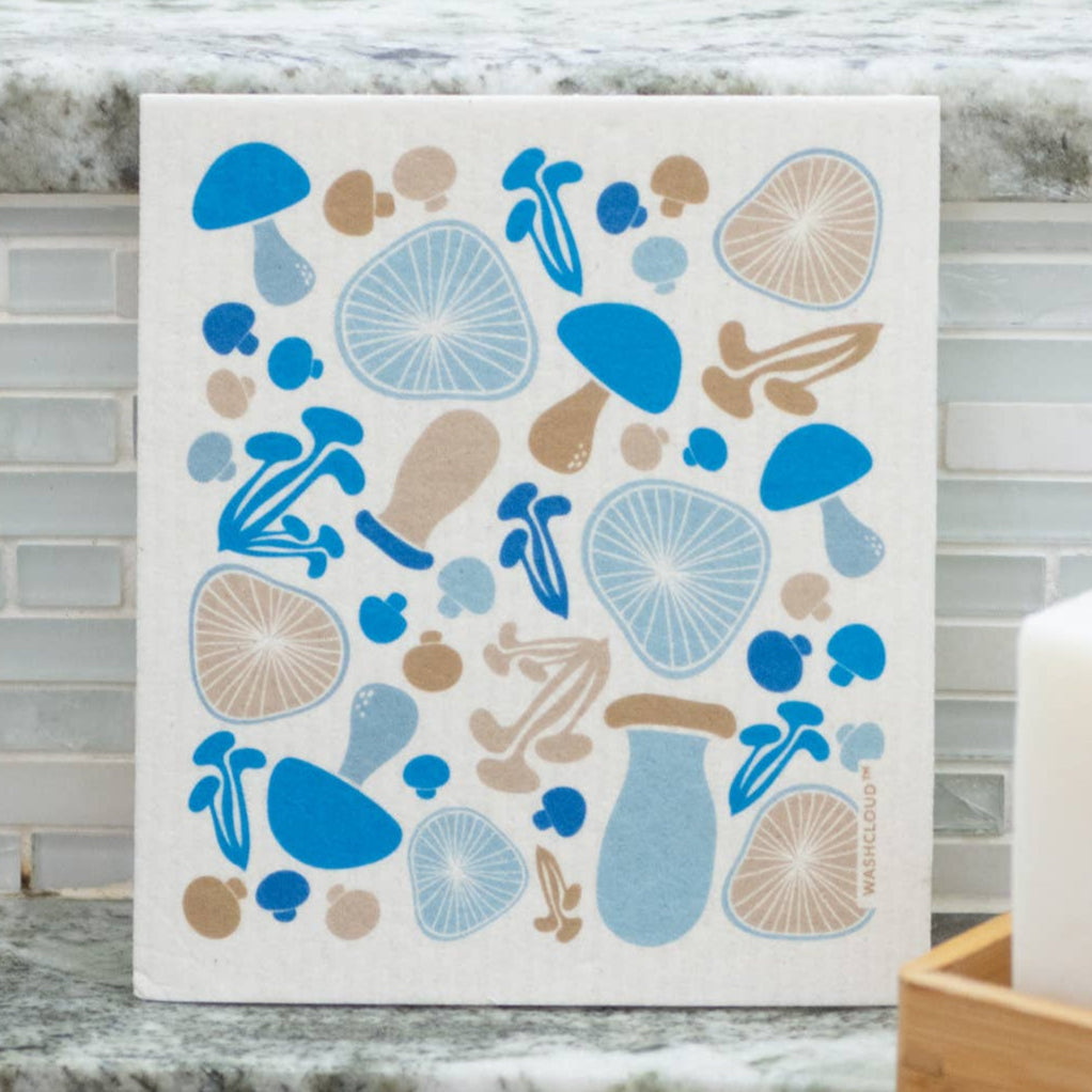 Patterned dishcloth on a kitchen counter with a soap bar