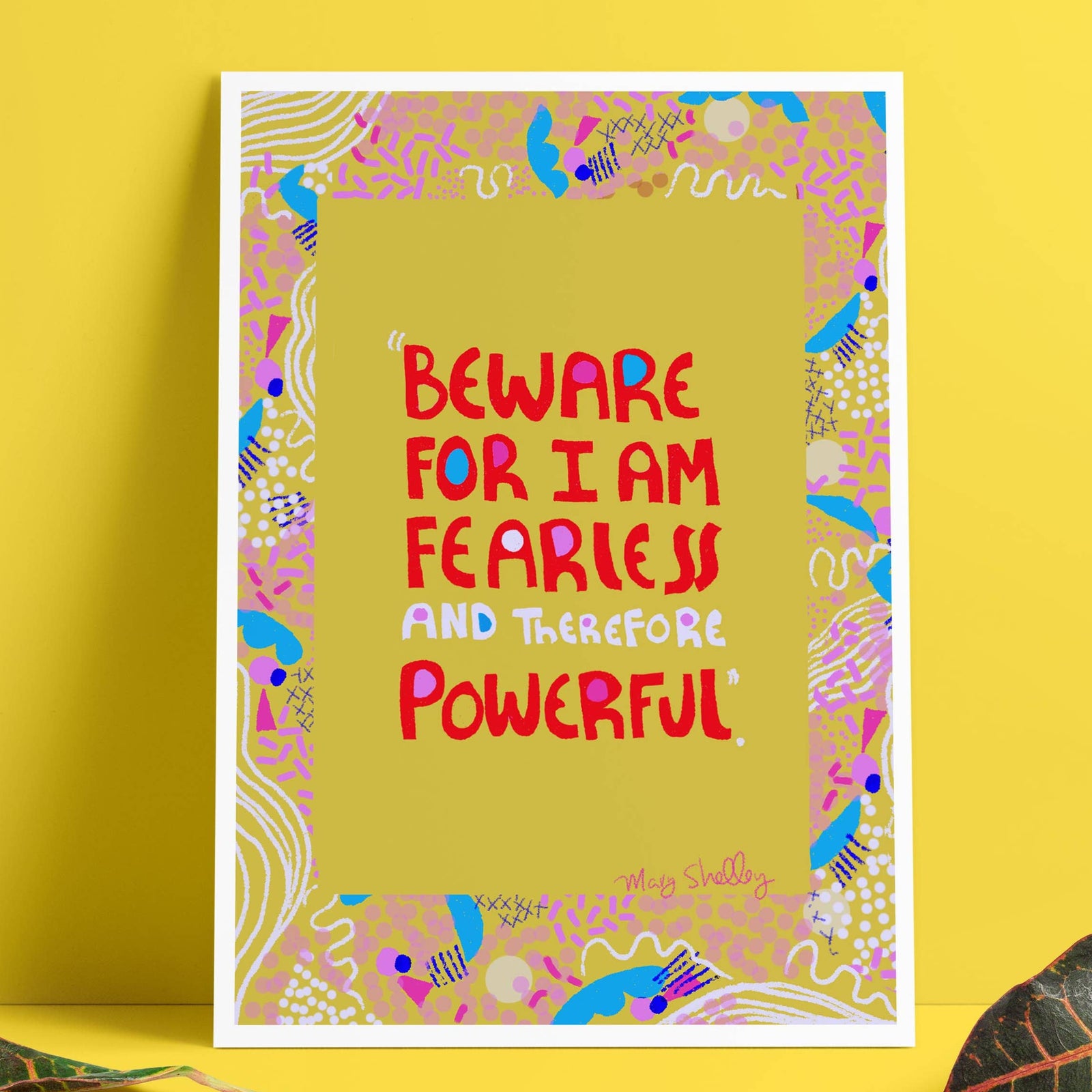 Colorful card with motivational quote on a yellow background