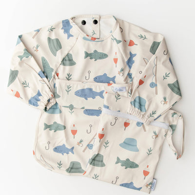 Baby bib with fish pattern on a cream background