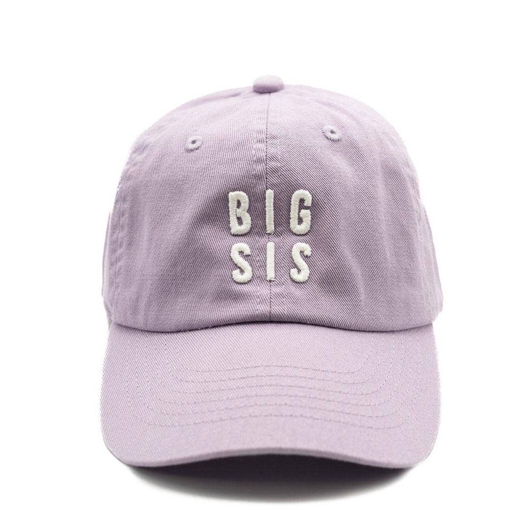 A light purple dad hat baseball cap with 'BIG SIS' embroidered in white on the front, shown against a plain white background.