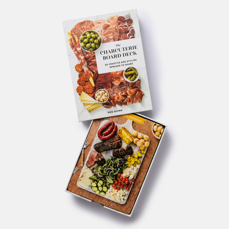 A box of a deck of cards with a charcuterie board theme.