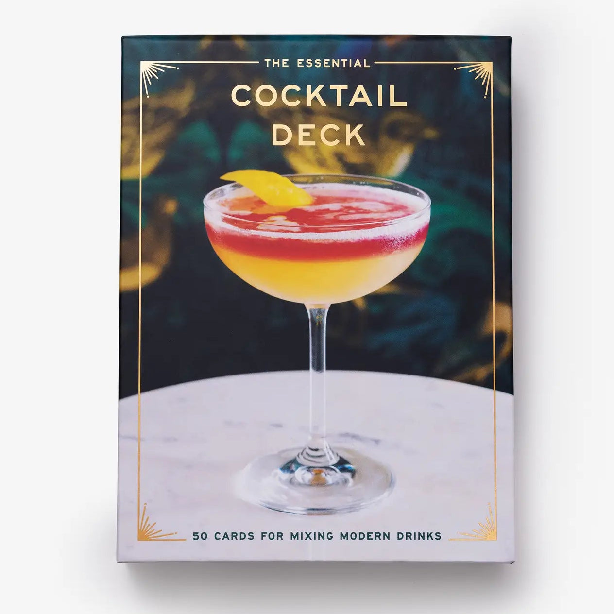 Box of a deck of cards with a cocktail on a white background