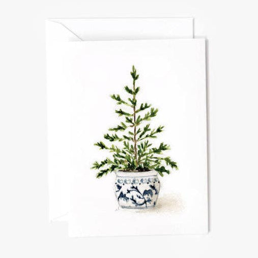 A mini notecard with a potted tree on a white background