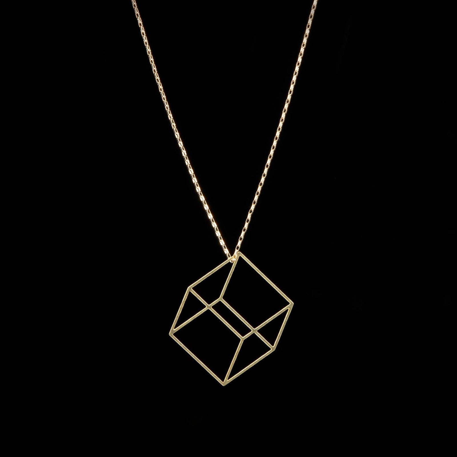 Cube necklace on a black background