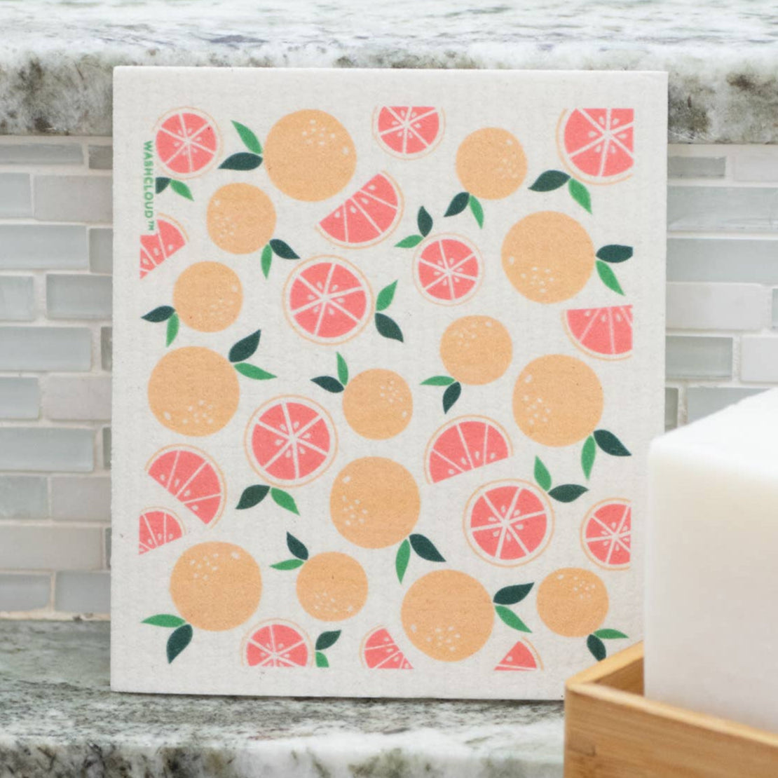 Dishcloth with fruit pattern on a kitchen counter
