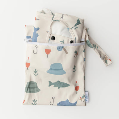 Baby bib with patterned bag on a light background