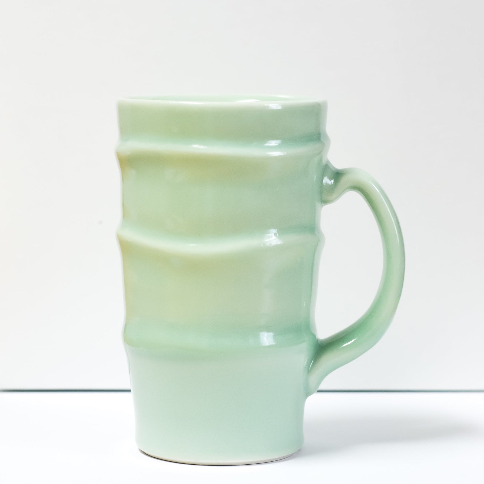 https://giftandgather.com/cdn/shop/products/jumbo-lined-slip-mugs-964796_1600x.jpg?v=1674602107